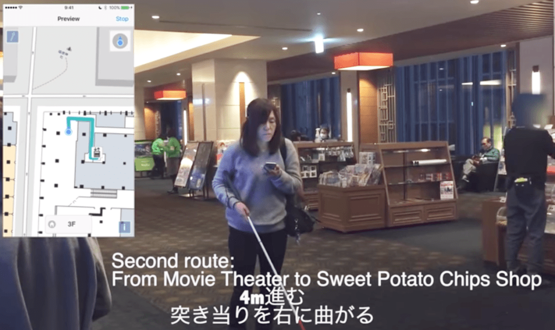 Chieko Asakawa testing the navigation system implemented in the Coredo Muromachi shopping center.